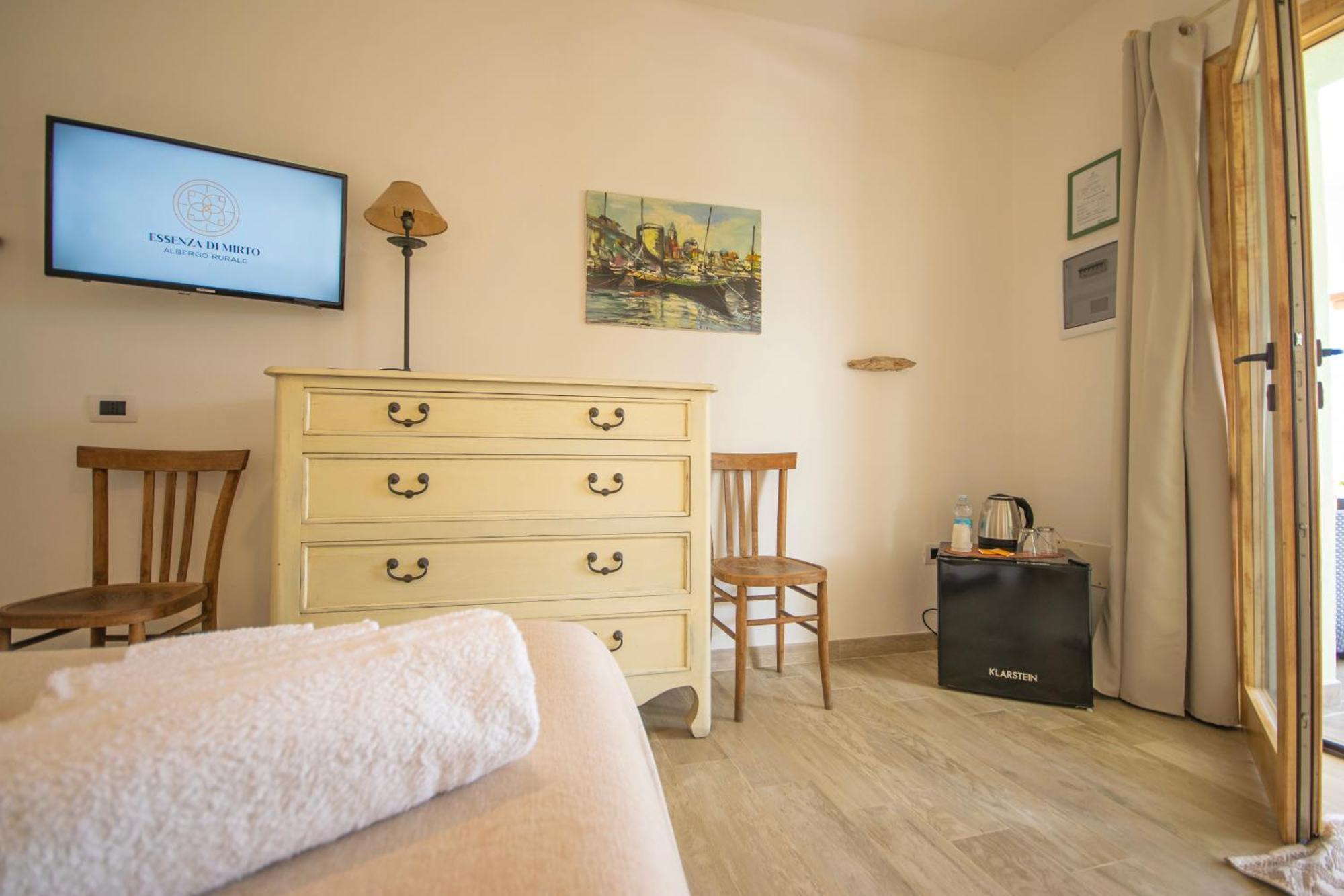 Albergo rurale Essenza di Mirto La Caletta Camera foto