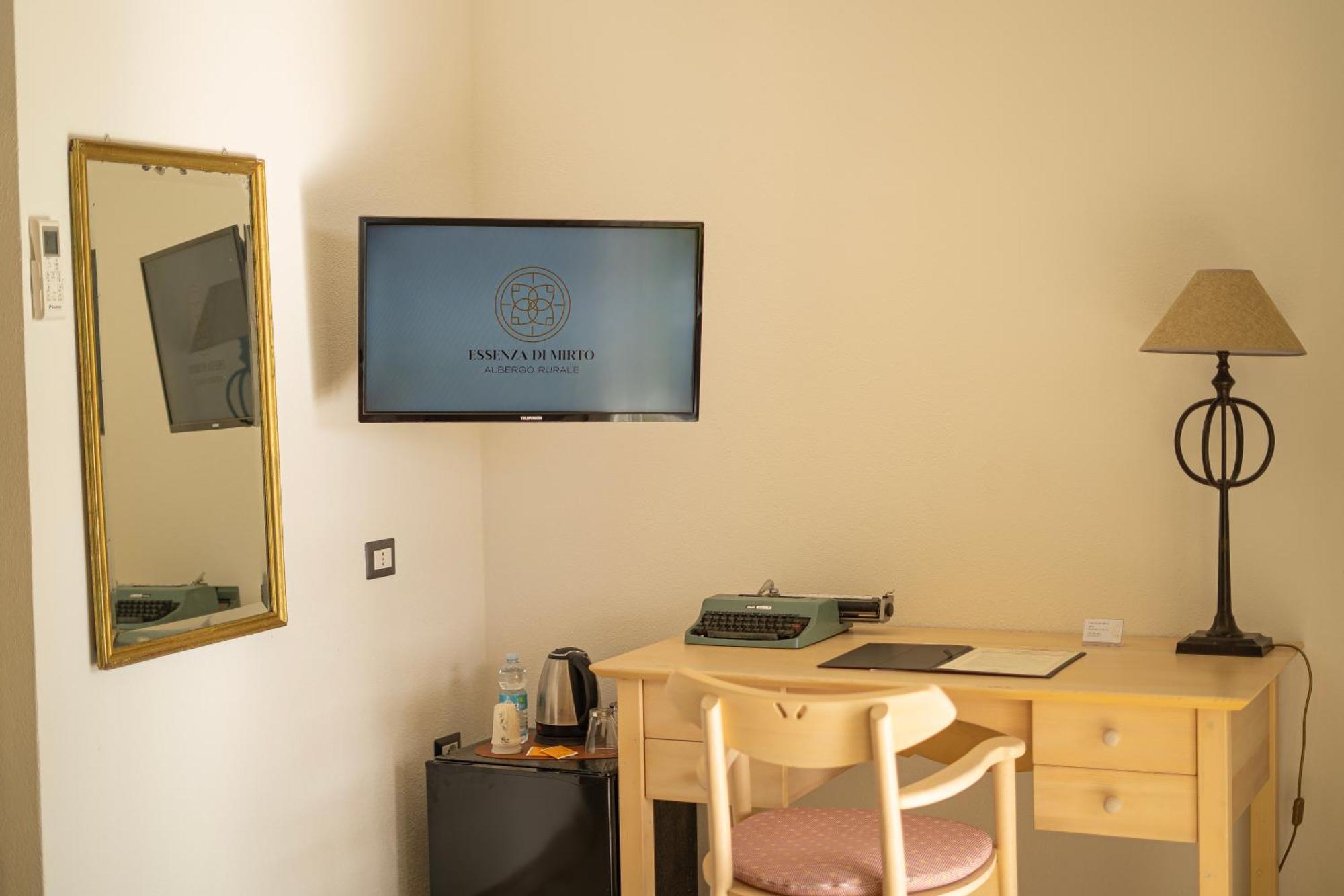 Albergo rurale Essenza di Mirto La Caletta Camera foto