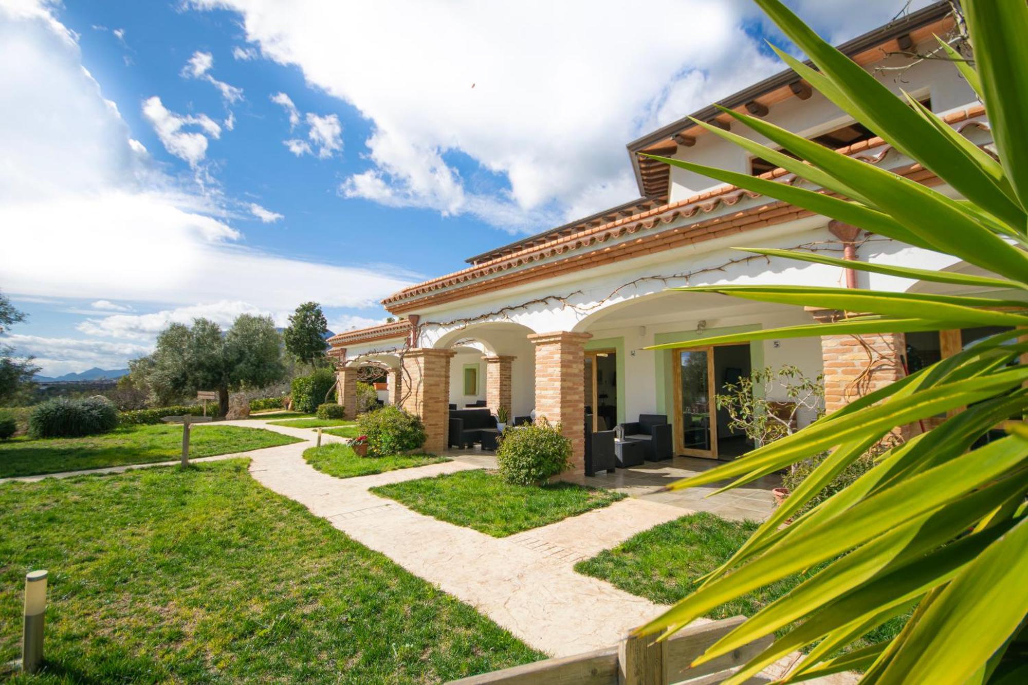 Albergo rurale Essenza di Mirto La Caletta Esterno foto